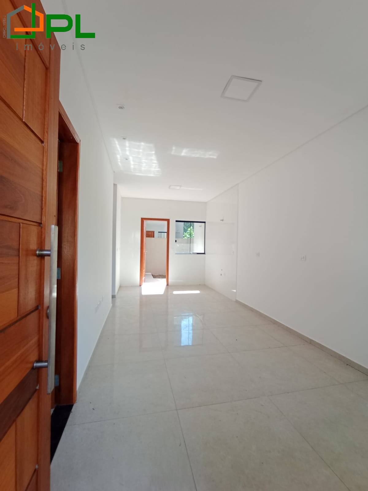 Casa à venda com 3 quartos, 59m² - Foto 2